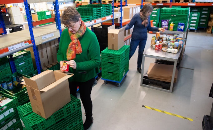 volunteers preparing emergency food parcel